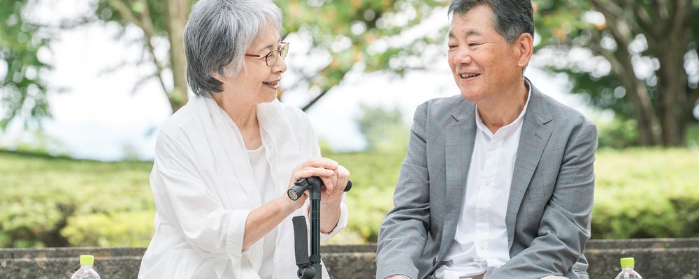 池田市の物件について相談する様子